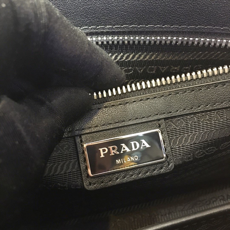 Pra*a clutch bags